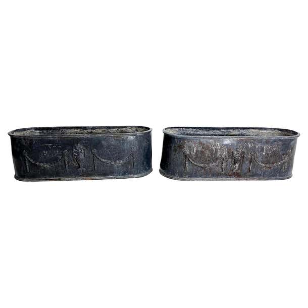 Pair of Early English Grey Lead Planters with Classical Decoration